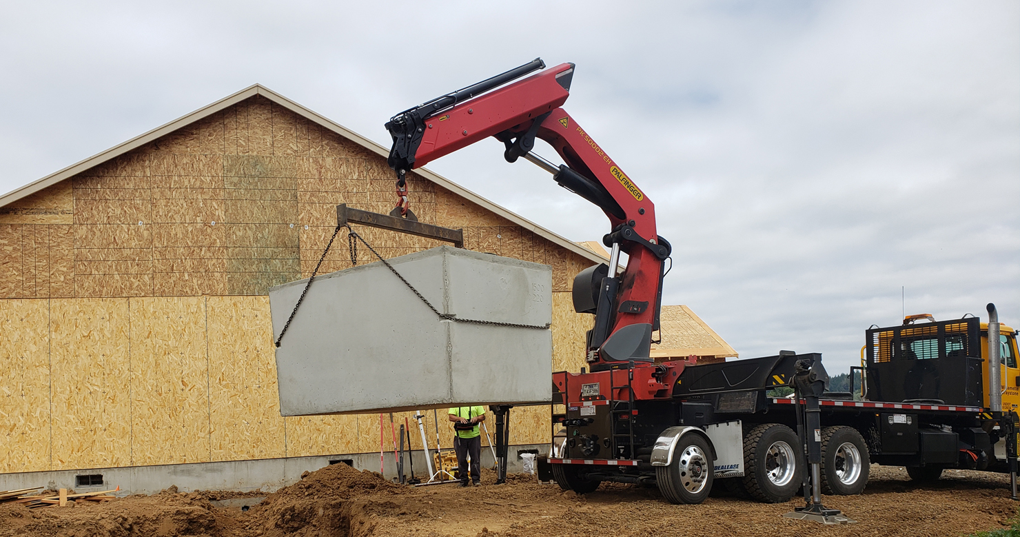 Fulcrum Contracting installing a concrete septic tank system in Douglas County OR