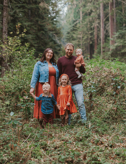 The Fulcrum Contracting owner and his family in a forest near Roseburg, Oregon